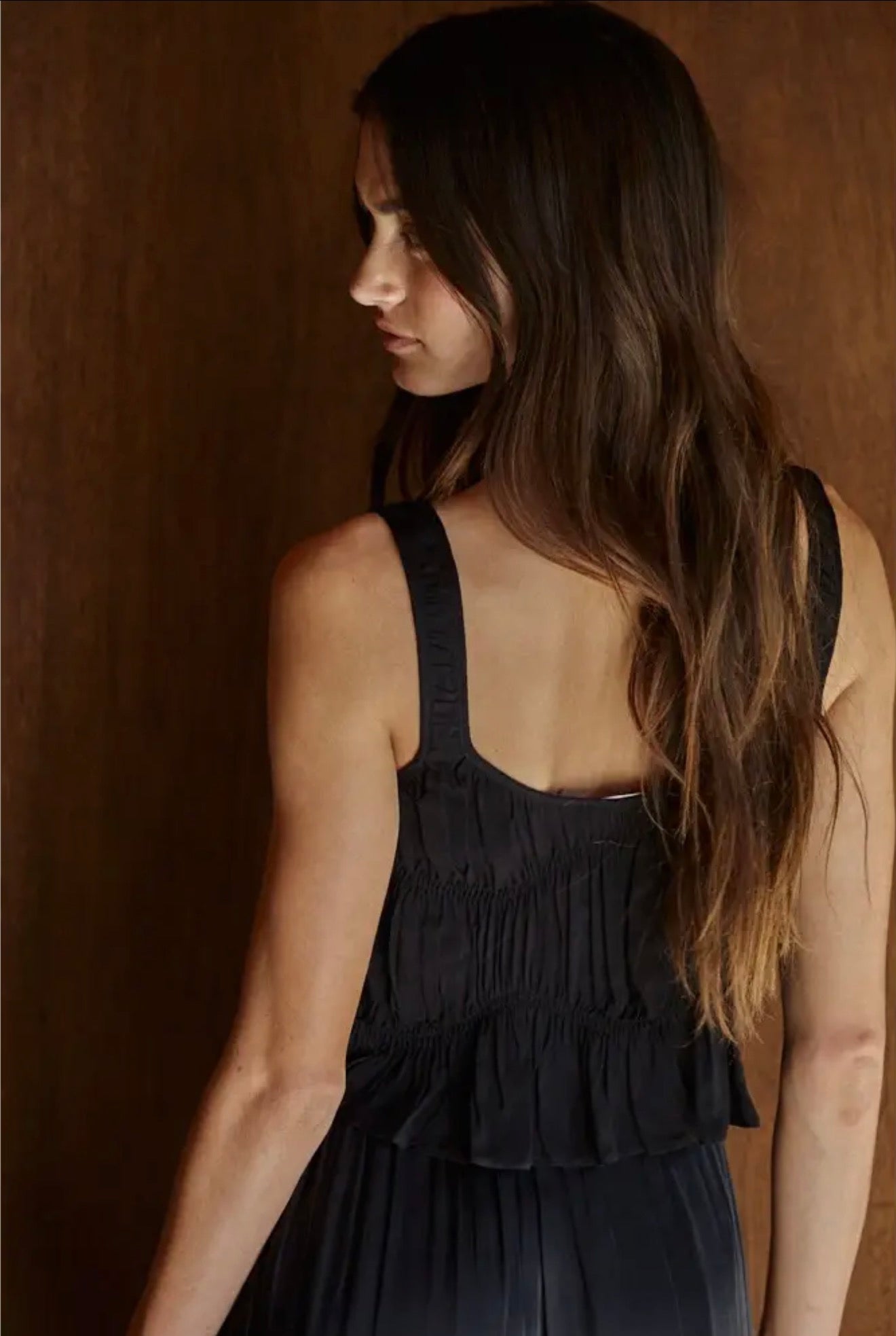 Woven Rayon Plunged V-Neck
Sleeveless Smocked Top