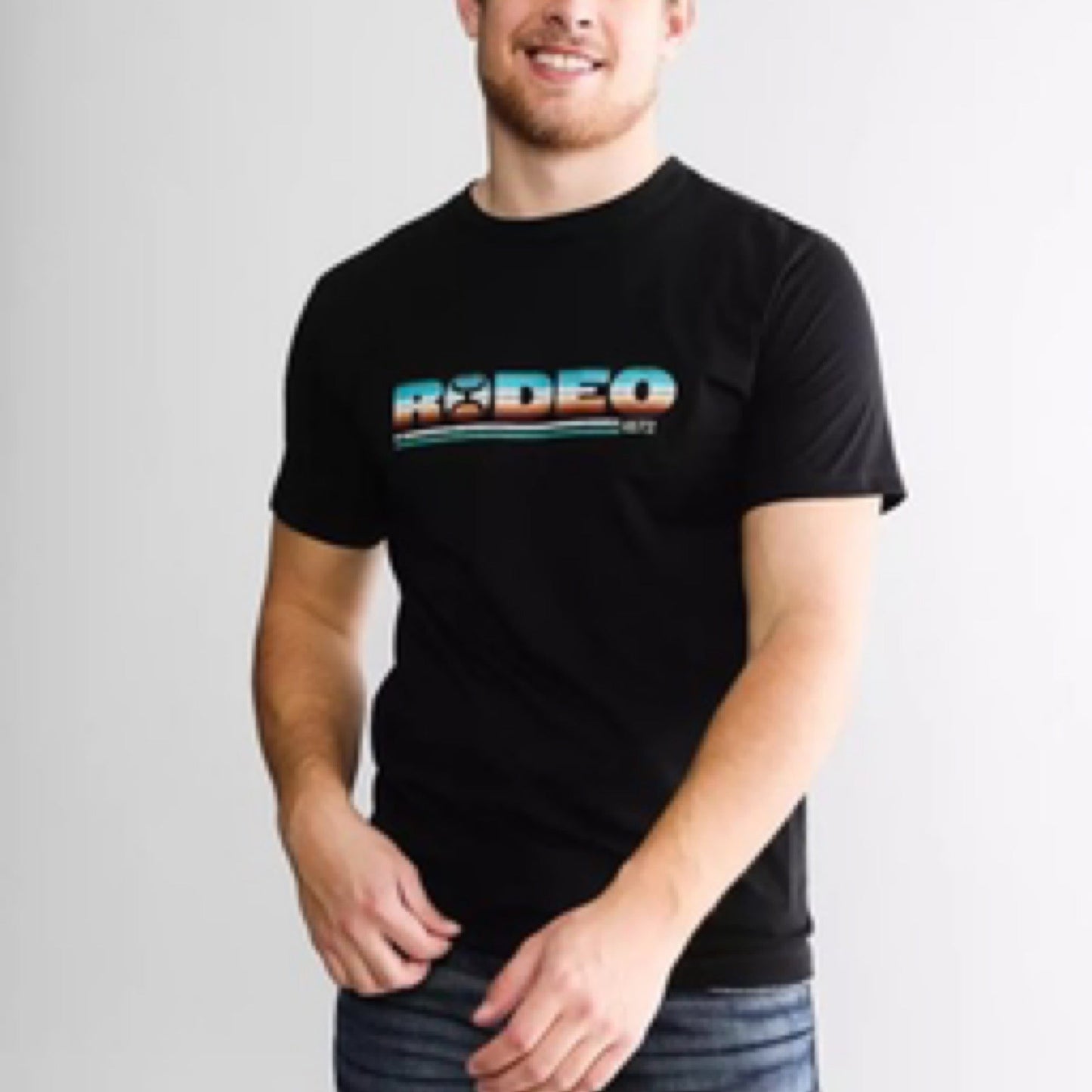 Rodeo, Men’s Black Crew Neck Cotton / Poly Short Sleeve T-Shirt with Serape Pattern Logo on Chest